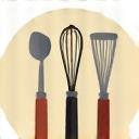 Various cooking utensils like whisks and knives